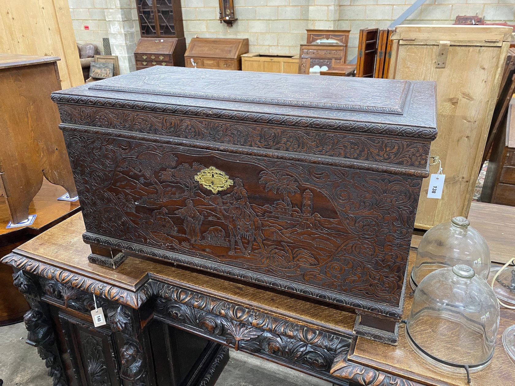 A carved teak coffer, length 101cm, depth 52cm, height 58cm